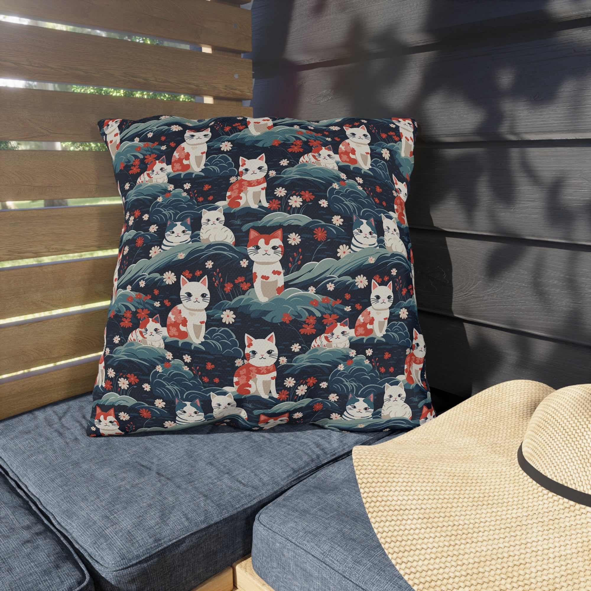 Outdoor Pillow - A serene and sweet Japanese landscape pattern featuring multicolored cats relaxing within a tranquil field of red and white flowers and gentle blue hills.