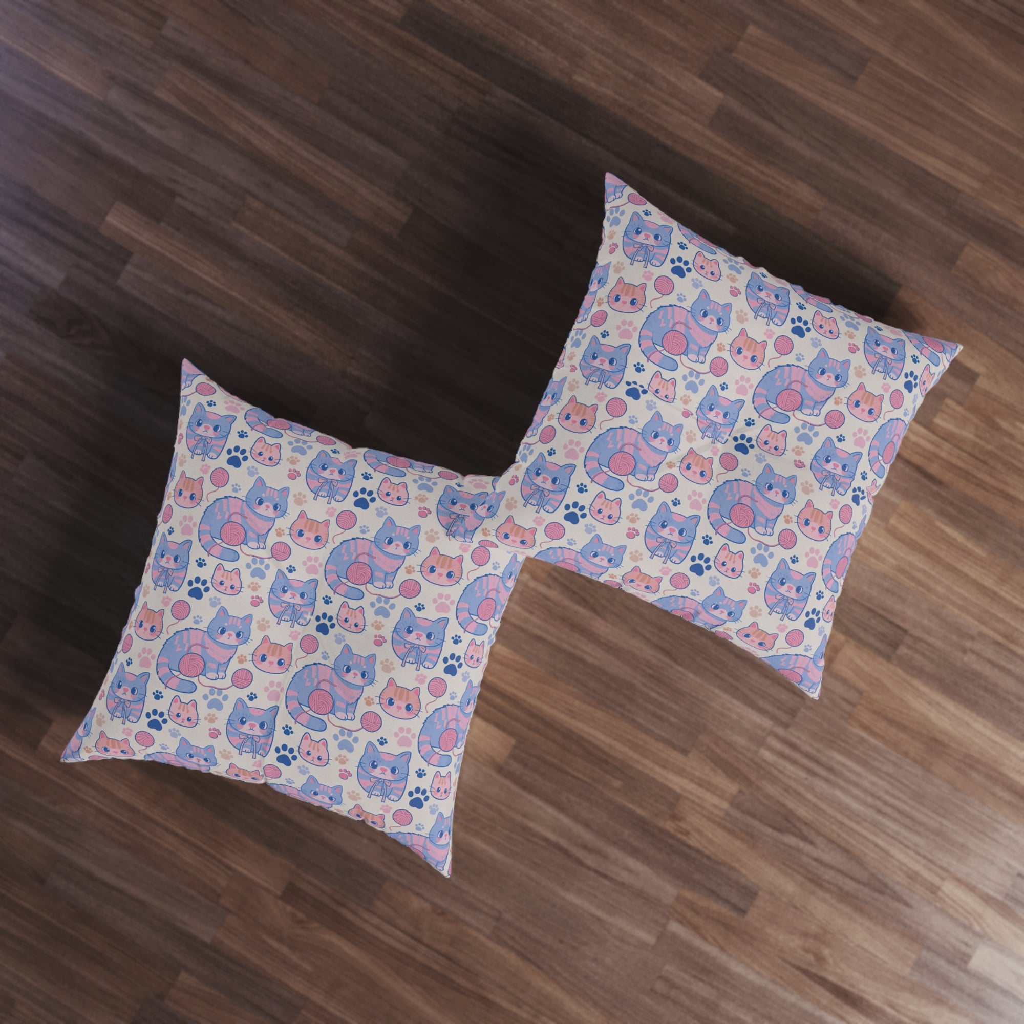 Indoor Square Floor Pillow - Sweet pastel blue and pink cartoon cats, cute kawaii style kittens with yarn and paw prints, charming and playful animal design, light cream background, delightful pet pattern