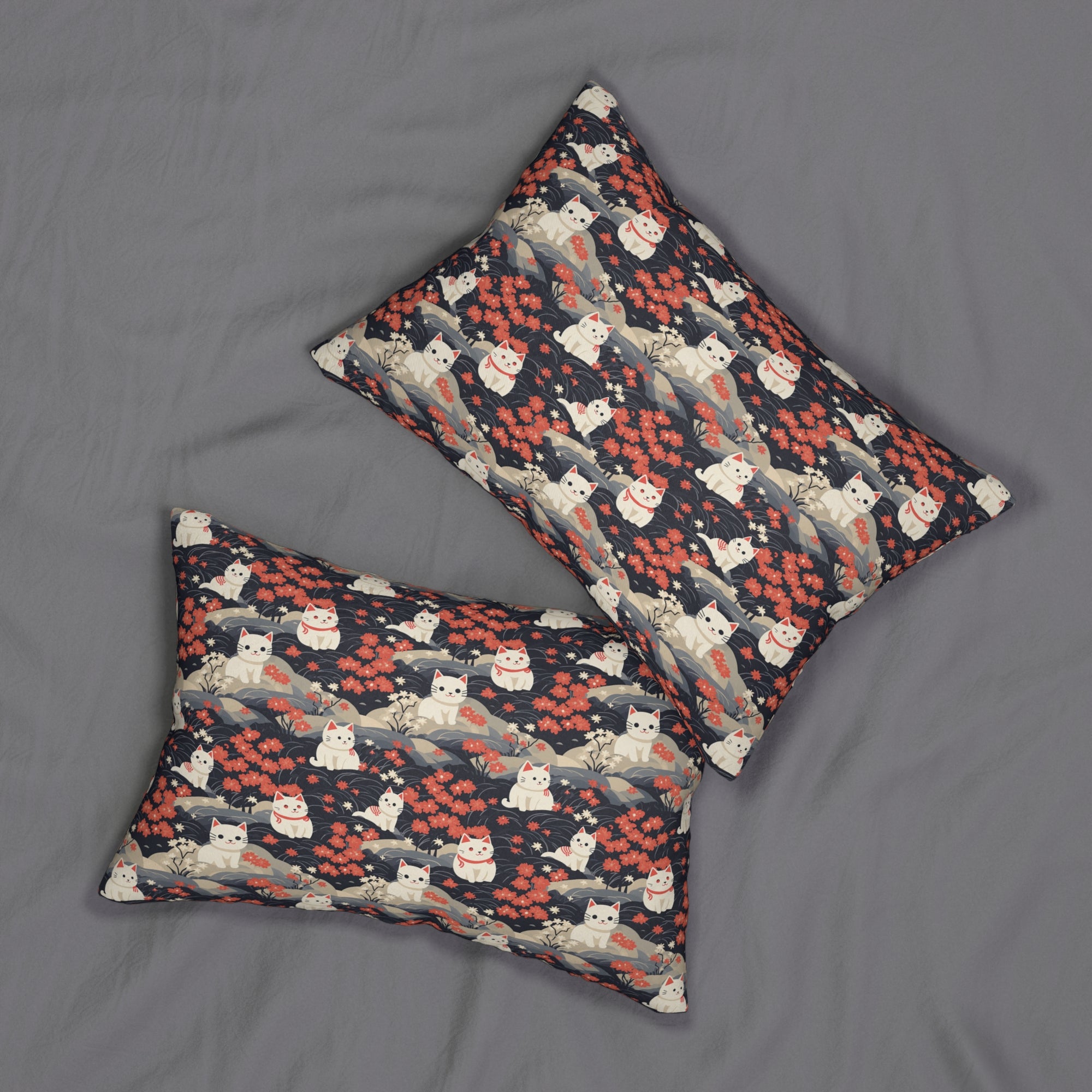 Indoor Lumbar Pillow - A charming, minimalist, Japanese-style illustration of cute white cats sitting amongst vibrant red and white flowers on a dark background.