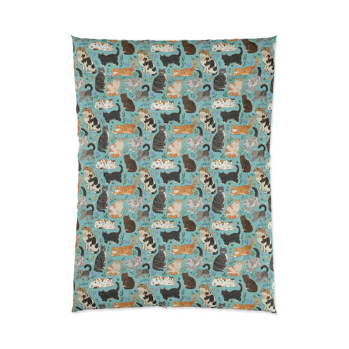 Comforter - A Delightful Assortment of Charming Cats in Diverse Poses and Breeds Scattered Across a Soft Blue Floral Background