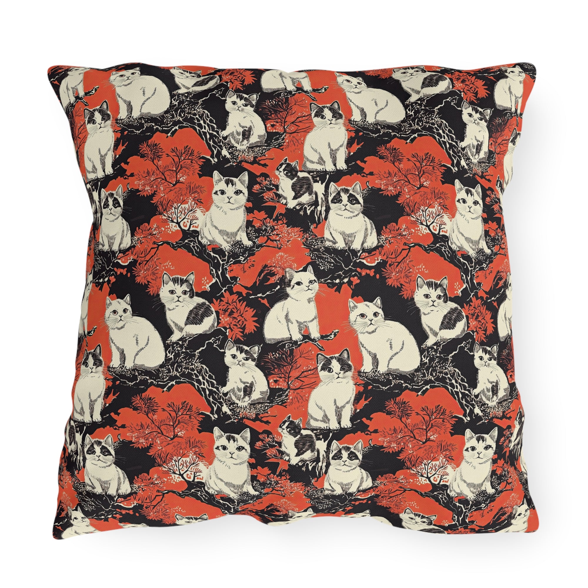 Outdoor Pillow - A striking black-and-white illustration with red accents of charming cats perched on the branches of trees in a beautiful Japanese woodblock print style.