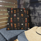 Outdoor Pillow - A striking and sophisticated Art Deco-style pattern of felines with bold, intricate lines and dramatic geometric shapes, all rendered in a unique gold and gray color palette.