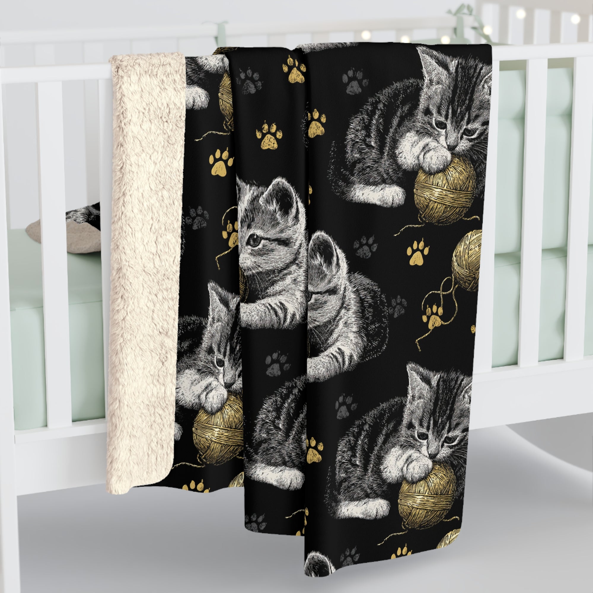 Sherpa Blanket - Grey and White Kittens Playing with Golden Yarn on a Black Background with Paw Prints