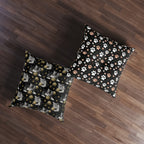 Indoor Square Floor Pillow - Grey and White Kittens Playing with Golden Yarn on a Black Background with Paw Prints