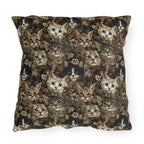 Outdoor Pillow - An intricate and detailed vintage illustration featuring a close-up of various fluffy cats with bright eyes amidst lush, ornate floral foliage in sepia tones.