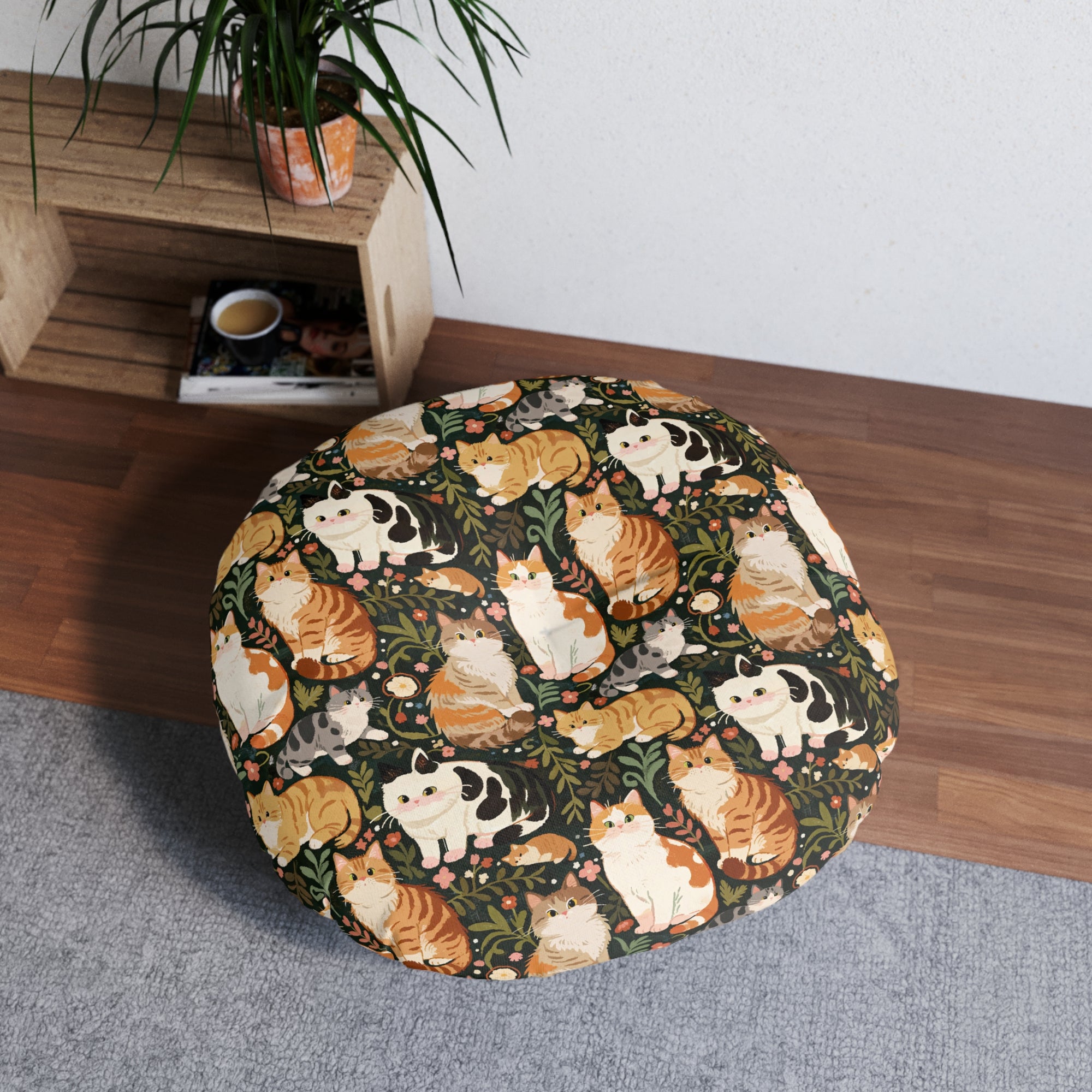 Indoor Round Floor Pillow - Whimsical cat and kitten garden party, various cat breeds amidst green foliage and pink flowers, charming animal illustration, dark forest green background, playful and natural art