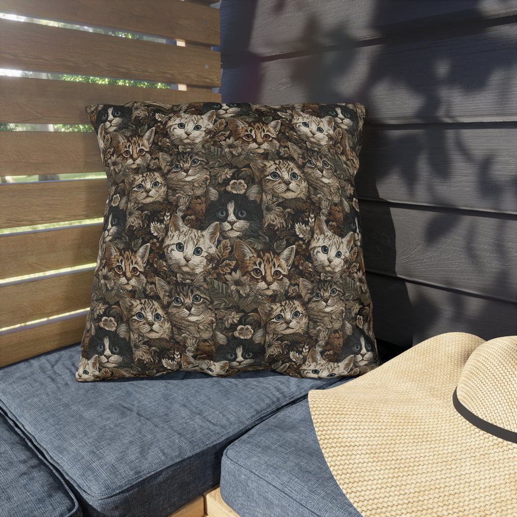 Outdoor Pillow - An intricate and detailed vintage illustration featuring a close-up of various fluffy cats with bright eyes amidst lush, ornate floral foliage in sepia tones.