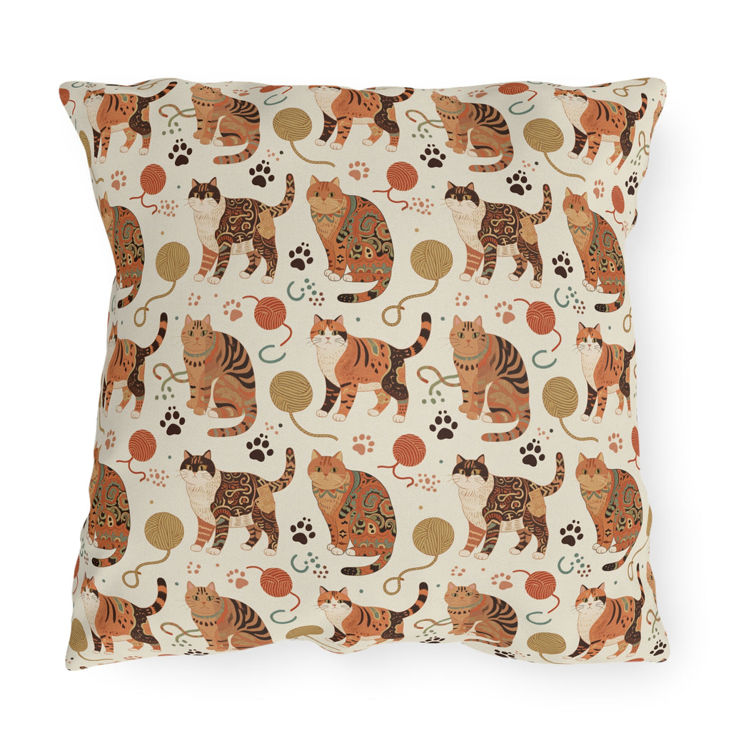 Outdoor Pillow - Artistic patterned cats in warm earth tones, unique tribal and folk art designs, playful felines with yarn and paw prints, bohemian animal print, cream background, creative cat art