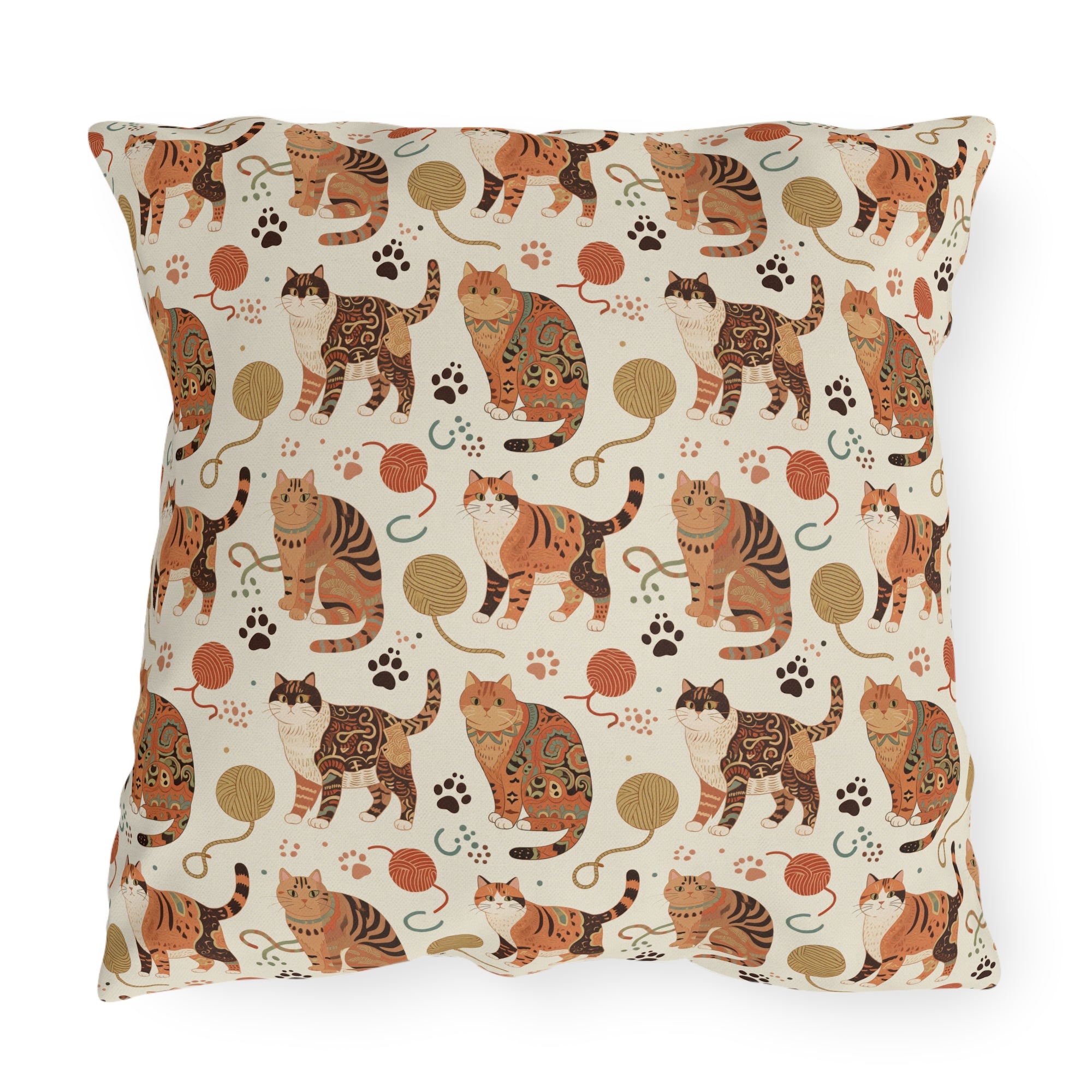 Outdoor Pillow - Artistic patterned cats in warm earth tones, unique tribal and folk art designs, playful felines with yarn and paw prints, bohemian animal print, cream background, creative cat art