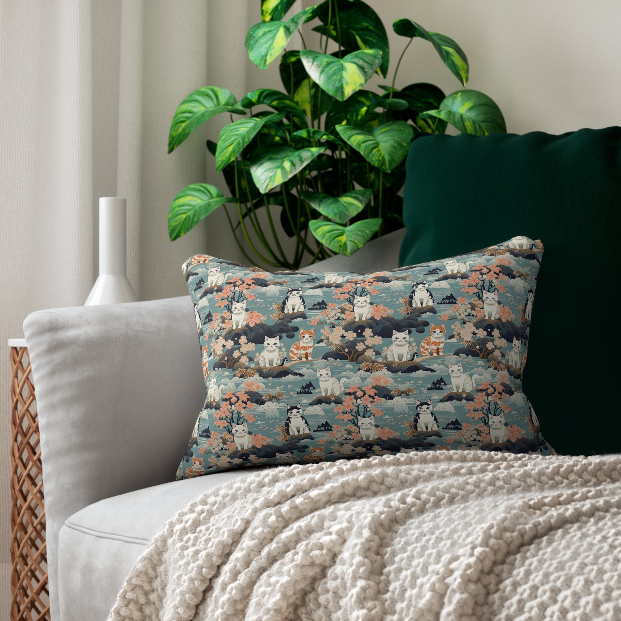 Indoor Lumbar Pillow - A serene watercolor painting of fluffy cats lounging on rocks, surrounded by cherry blossoms and blue water, in a tranquil, nature-filled, Japanese-inspired landscape.