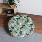 Indoor Round Floor Pillow - A Delightful Assortment of Charming Cats in Diverse Poses and Breeds Scattered Across a Soft Blue Floral Background