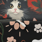 Indoor Lumbar Pillow - A detailed and ornate Victorian-style pattern featuring a tight grouping of fluffy cats of various colors surrounded by black and red flowers and leaves.