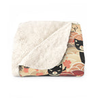 Sherpa Blanket - A whimsical and enchanting Japanese-style pattern featuring cute black and orange cats nestled among vibrant orange blossoms and soft, cloudy backgrounds.