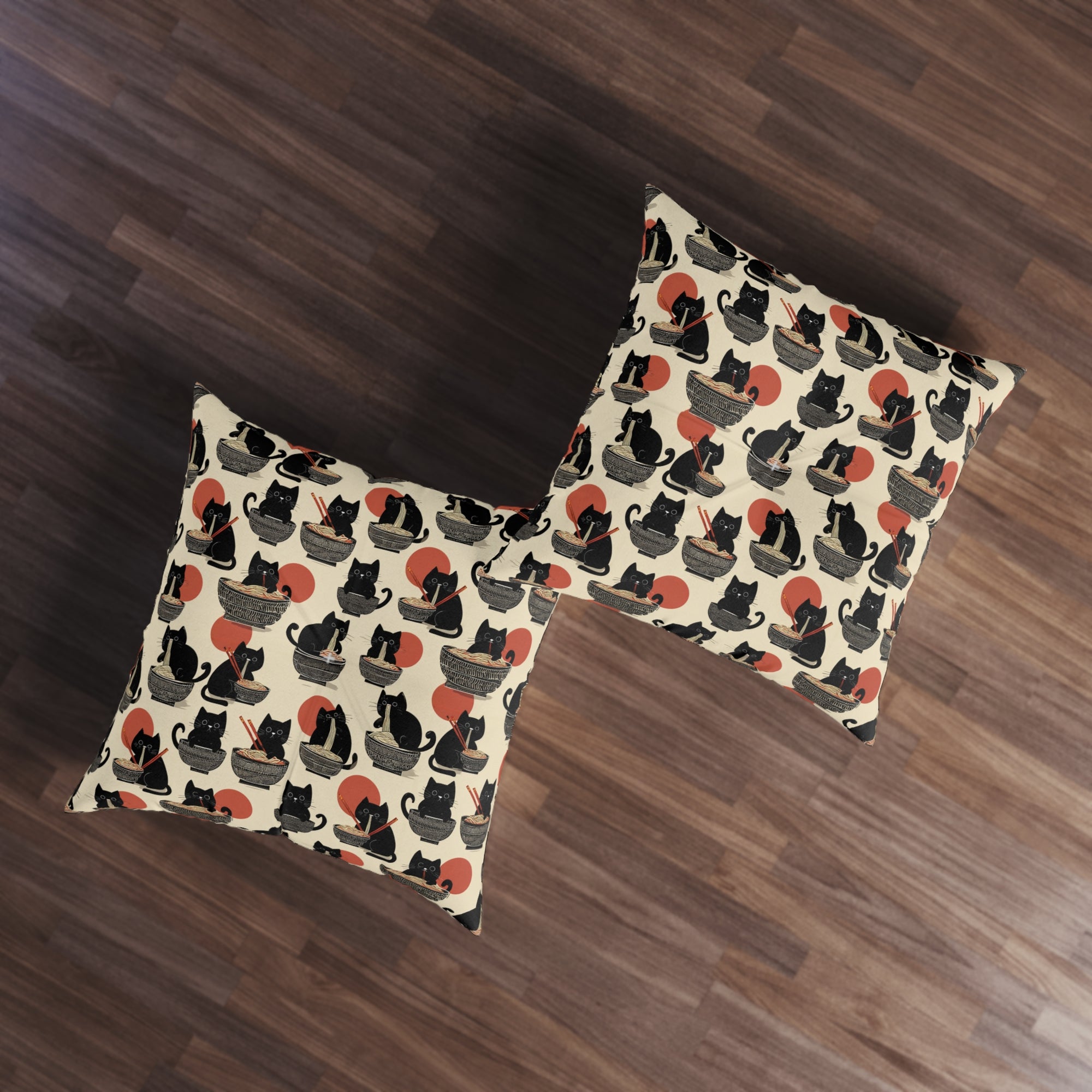 Indoor Square Floor Pillow - A whimsical and delightful hand-drawn style pattern of adorable black cats eating bowls of delicious ramen noodles with a large red sun in the background.