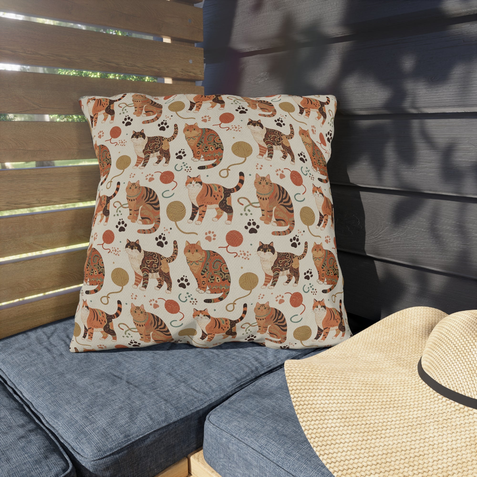 Outdoor Pillow - Artistic patterned cats in warm earth tones, unique tribal and folk art designs, playful felines with yarn and paw prints, bohemian animal print, cream background, creative cat art