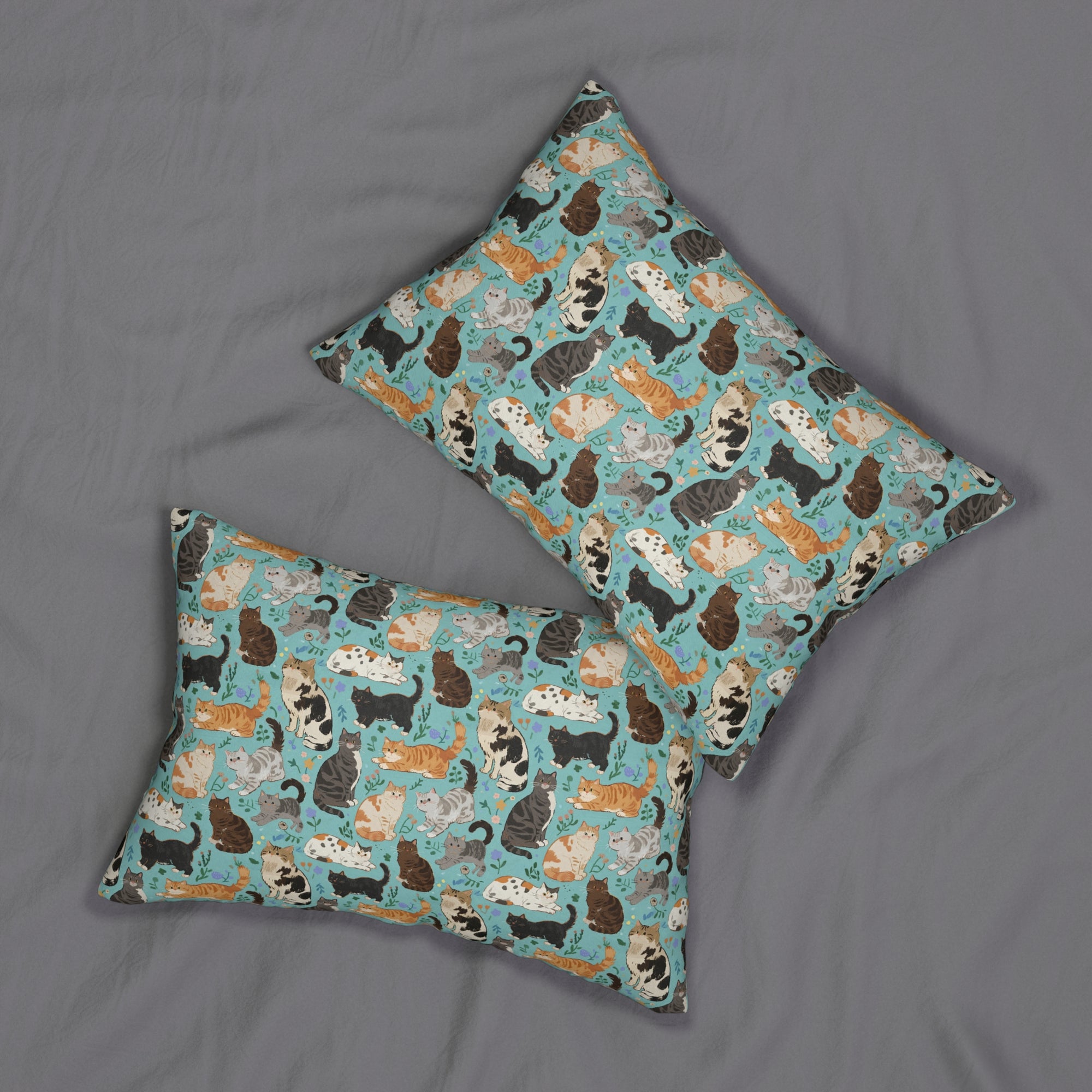 Indoor Lumbar Pillow - A Delightful Assortment of Charming Cats in Diverse Poses and Breeds Scattered Across a Soft Blue Floral Background