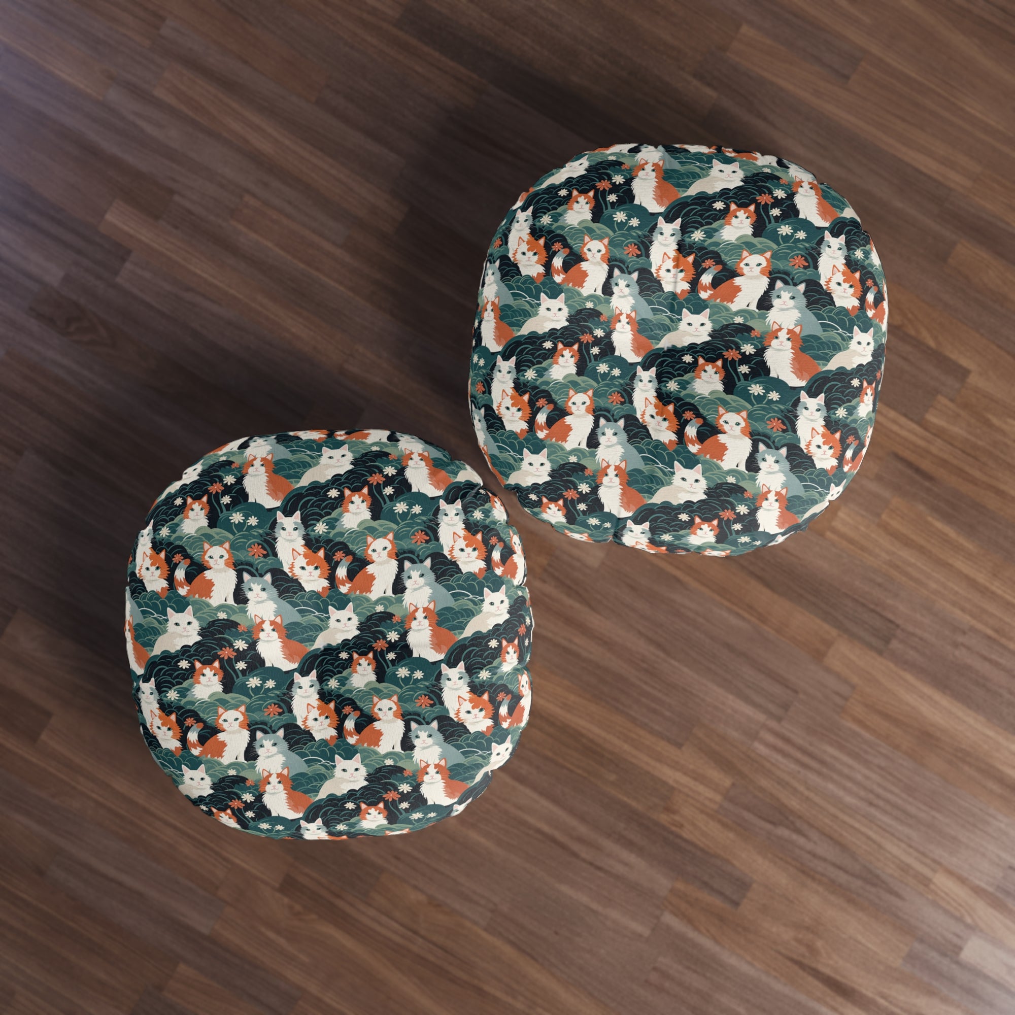 Indoor Round Floor Pillow - A whimsical, fluffy, watercolor depiction of various cats of different colors peeking out from a dense dark blue and green bush with white flowers.