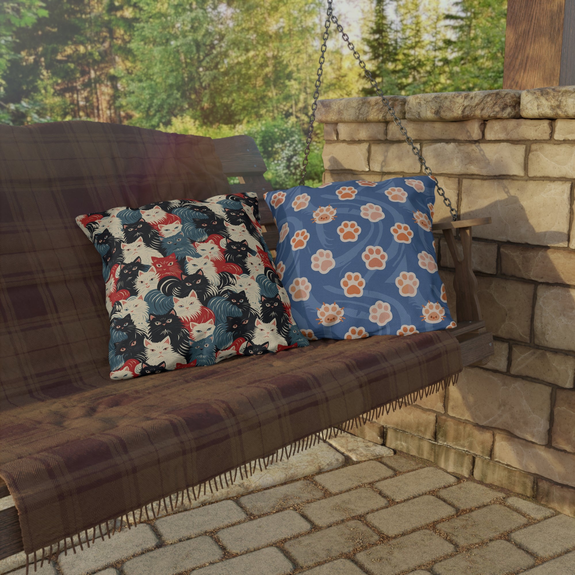 Outdoor Pillow - A bold and graphic pop art style illustration featuring a tight-knit cluster of various fluffy felines in black, white, red, and blue.