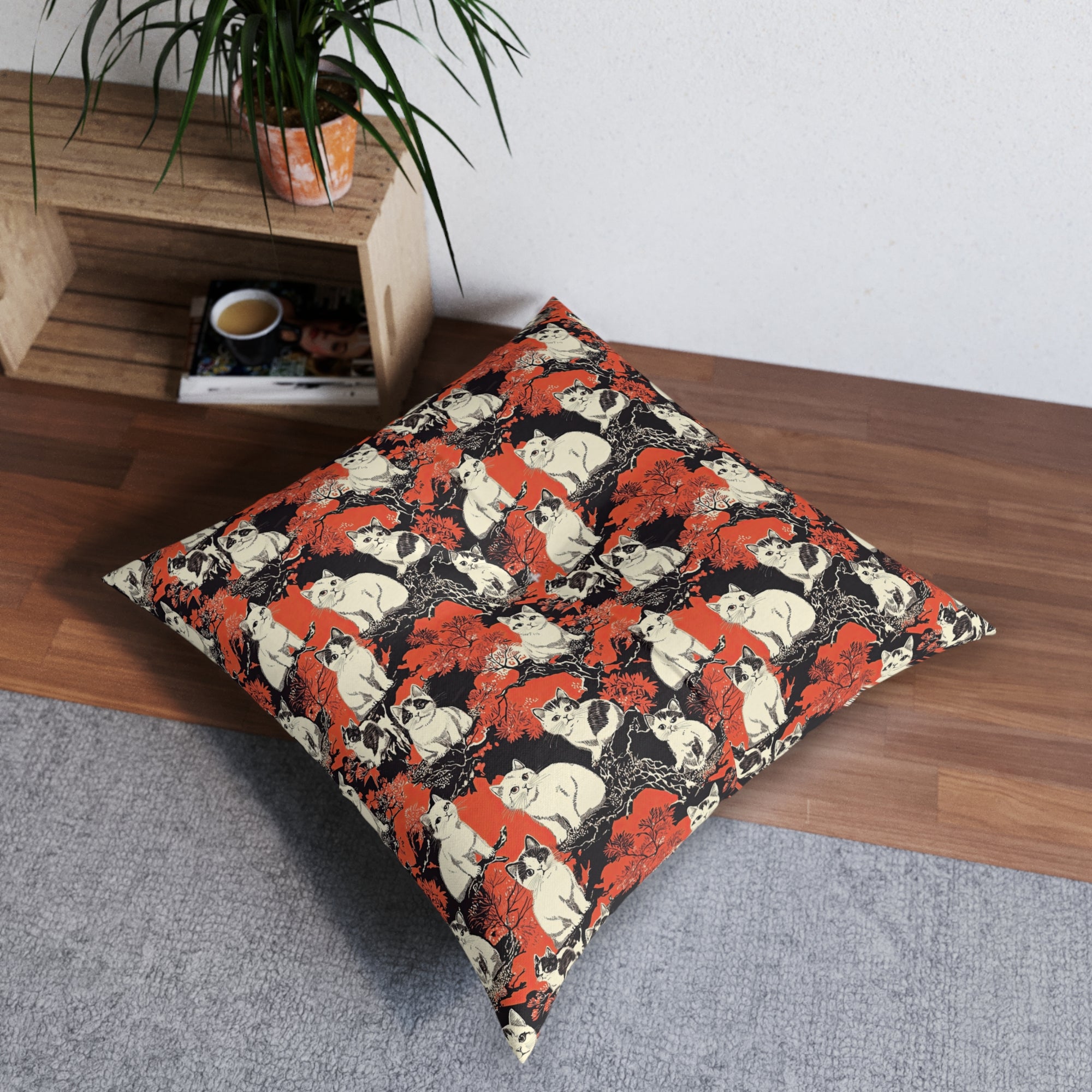 Indoor Square Floor Pillow - A striking black-and-white illustration with red accents of charming cats perched on the branches of trees in a beautiful Japanese woodblock print style.