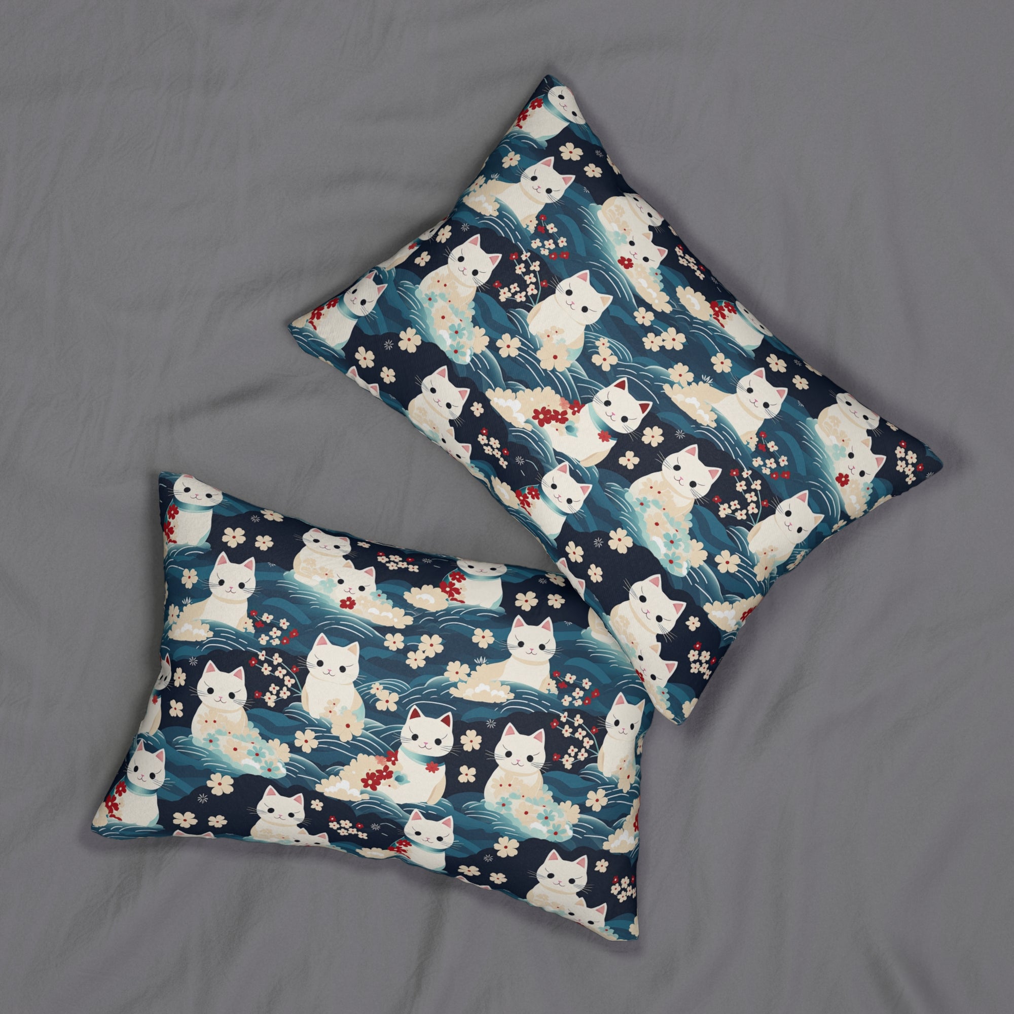Indoor Lumbar Pillow - A lovely, playful, Japanese-inspired illustration of sweet white cats sitting on rolling blue waves with red and white flowers and gentle clouds.