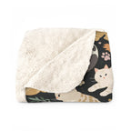 Sherpa Blanket - Diverse cats and kittens in a dark garden, various breeds and colors, soft natural tones with foliage and paw prints, charming animal illustration, dark background, gentle pet themed art