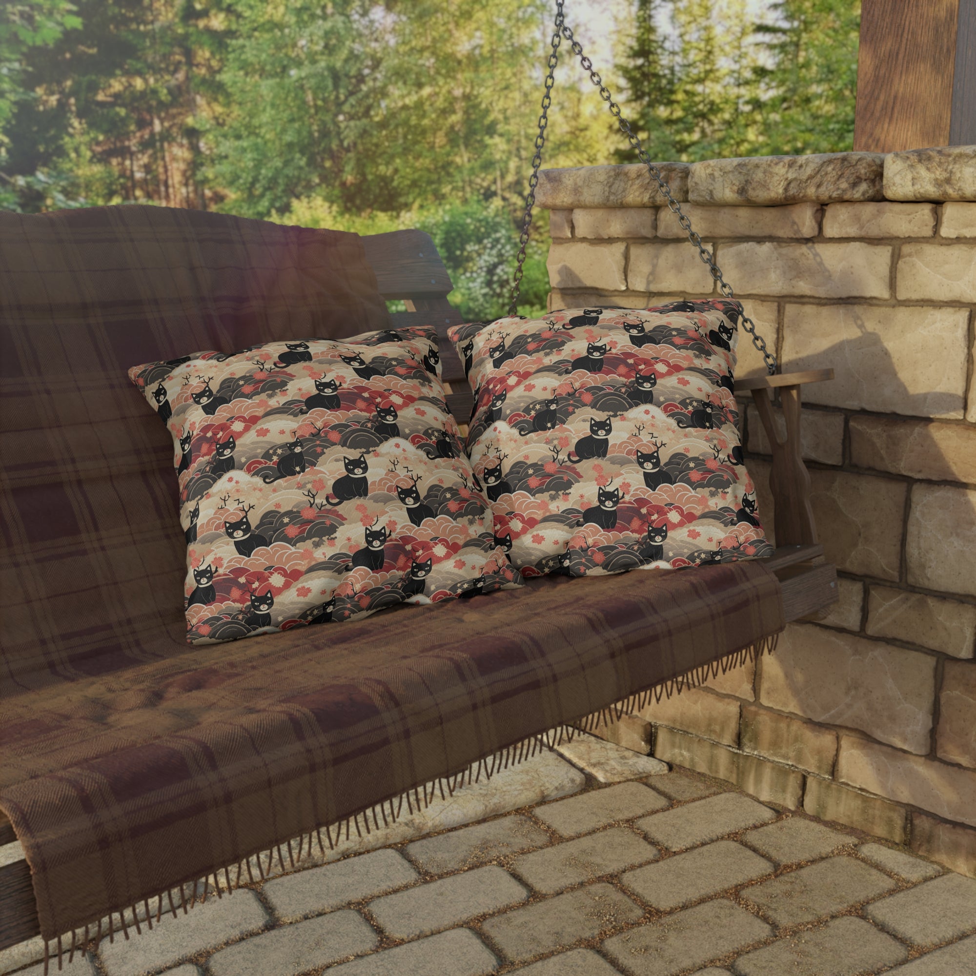 Outdoor Pillow - A whimsical and enchanting Japanese-style pattern featuring cute black and orange cats nestled among vibrant orange blossoms and soft, cloudy backgrounds.