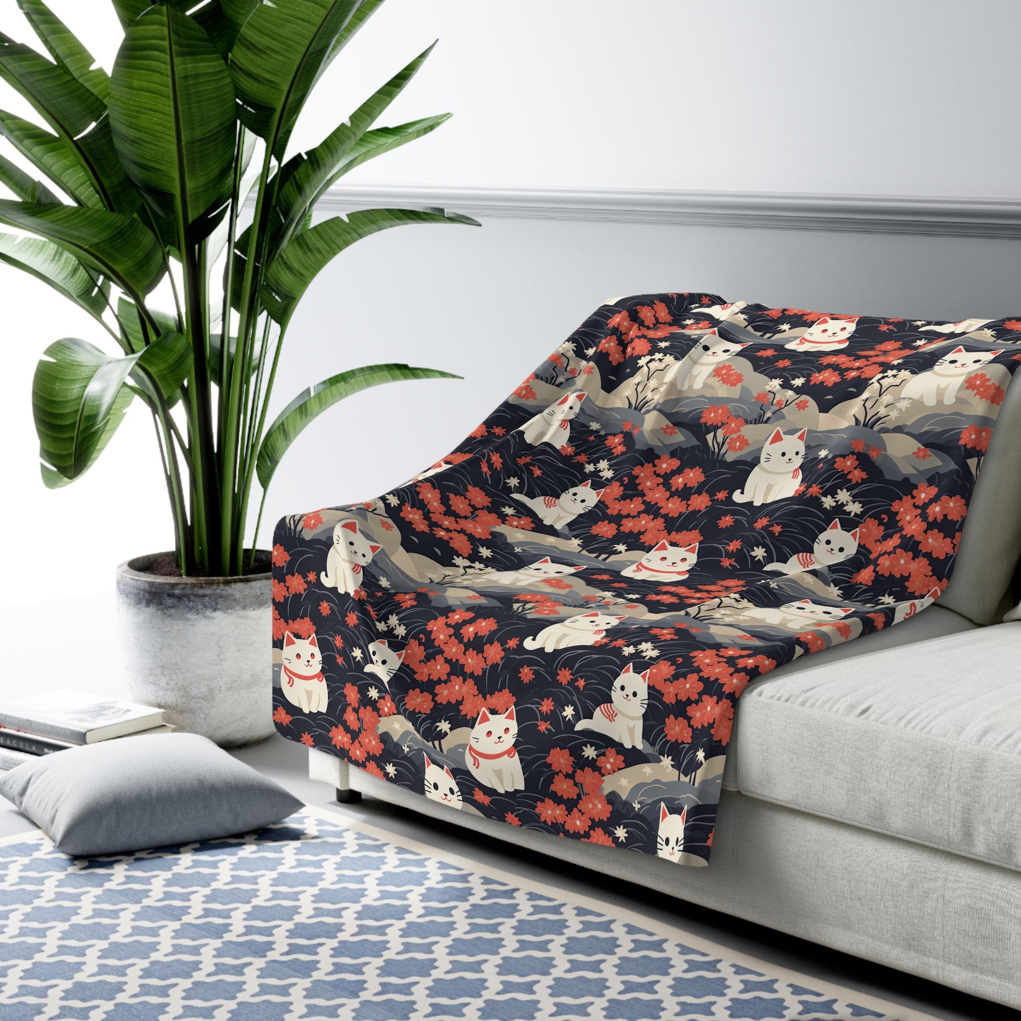 Sherpa Blanket - A charming, minimalist, Japanese-style illustration of cute white cats sitting amongst vibrant red and white flowers on a dark background.