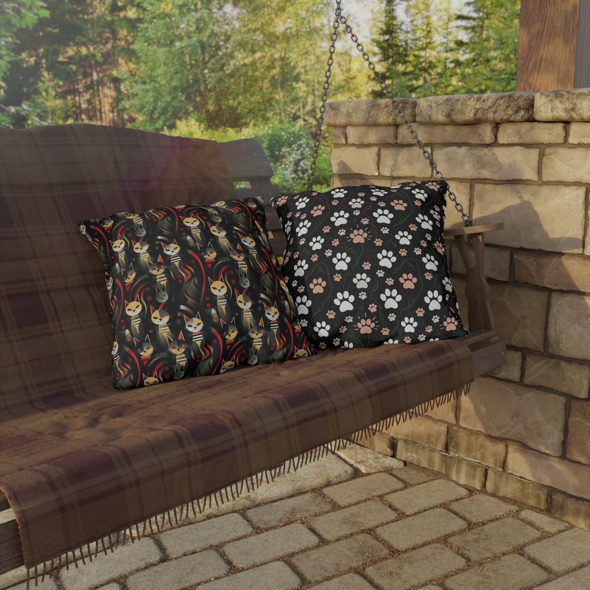 Outdoor Pillow - A bold and striking Art Deco pattern showcasing stylized feline portraits with sharp, gold lines and geometric shapes set against a dark, dramatic background.