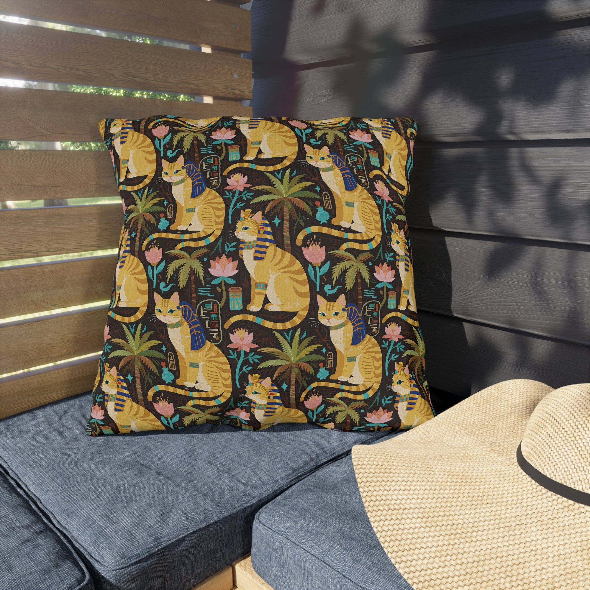 Outdoor Pillow - Golden Egyptian Cats with Pharaonic Headpieces Amidst Lush Palms and Lotus Flowers in an Exotic and Vibrant Scene