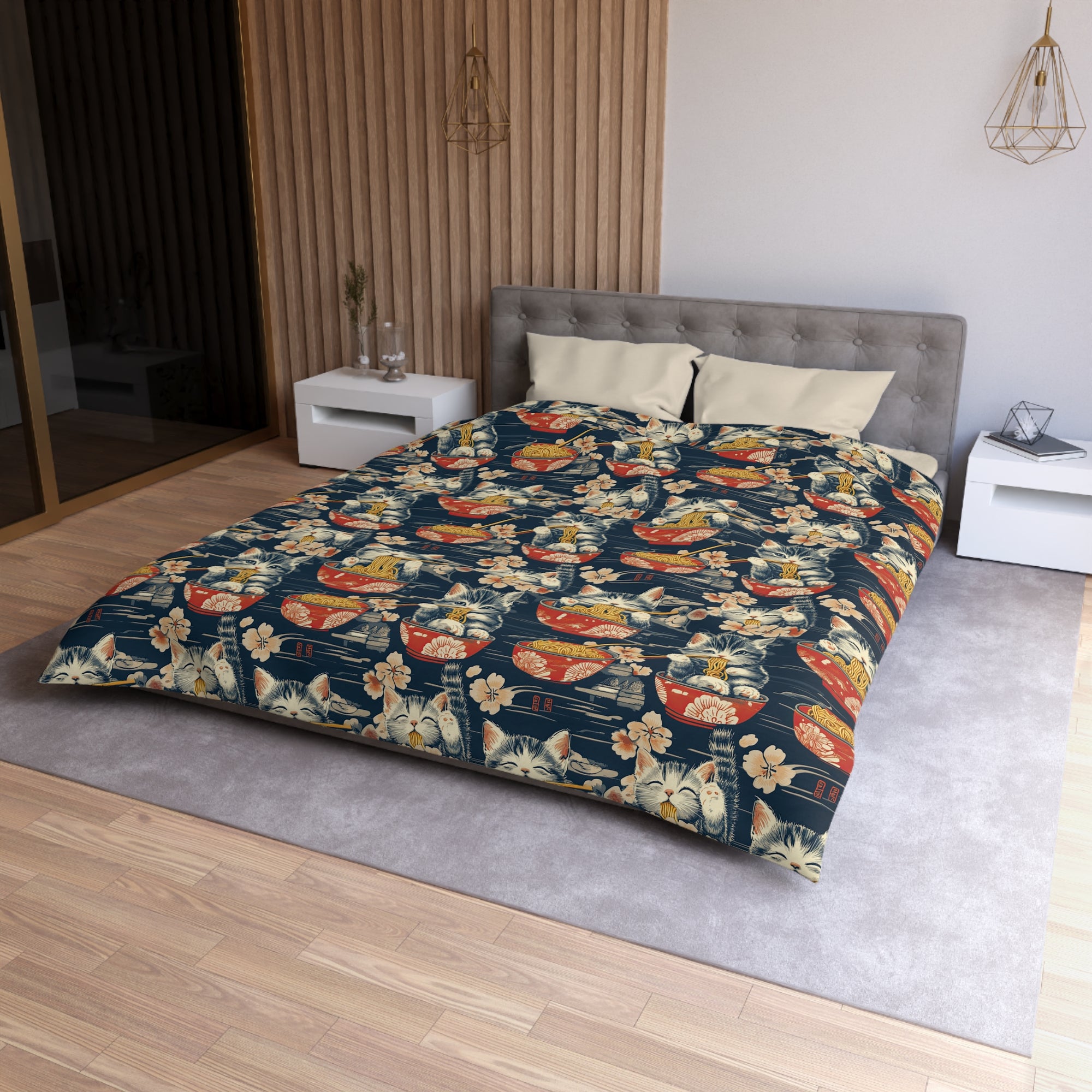 Duvet Cover - A charming and detailed illustration of happy kittens in red ramen bowls eating their noodles with chopsticks among beautiful pink cherry blossoms on a dark background.