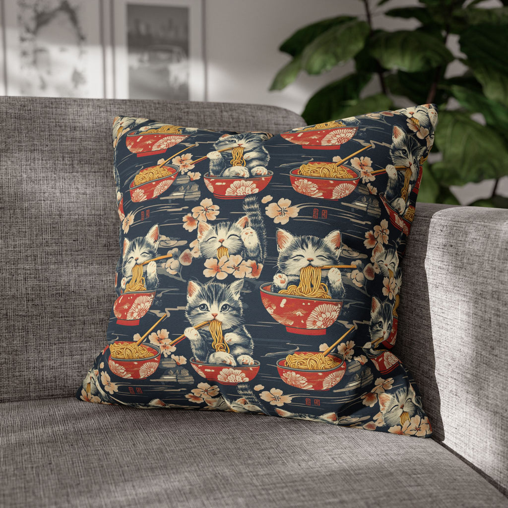 Square Pillowcase - A charming and detailed illustration of happy kittens in red ramen bowls eating their noodles with chopsticks among beautiful pink cherry blossoms on a dark background.