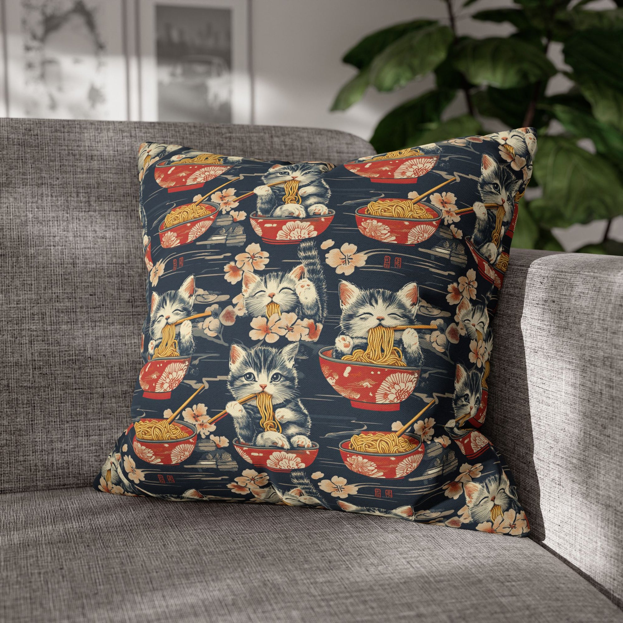 Square Pillowcase - A charming and detailed illustration of happy kittens in red ramen bowls eating their noodles with chopsticks among beautiful pink cherry blossoms on a dark background.