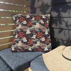 Outdoor Pillow - A charming, minimalist, Japanese-style illustration of cute white cats sitting amongst vibrant red and white flowers on a dark background.