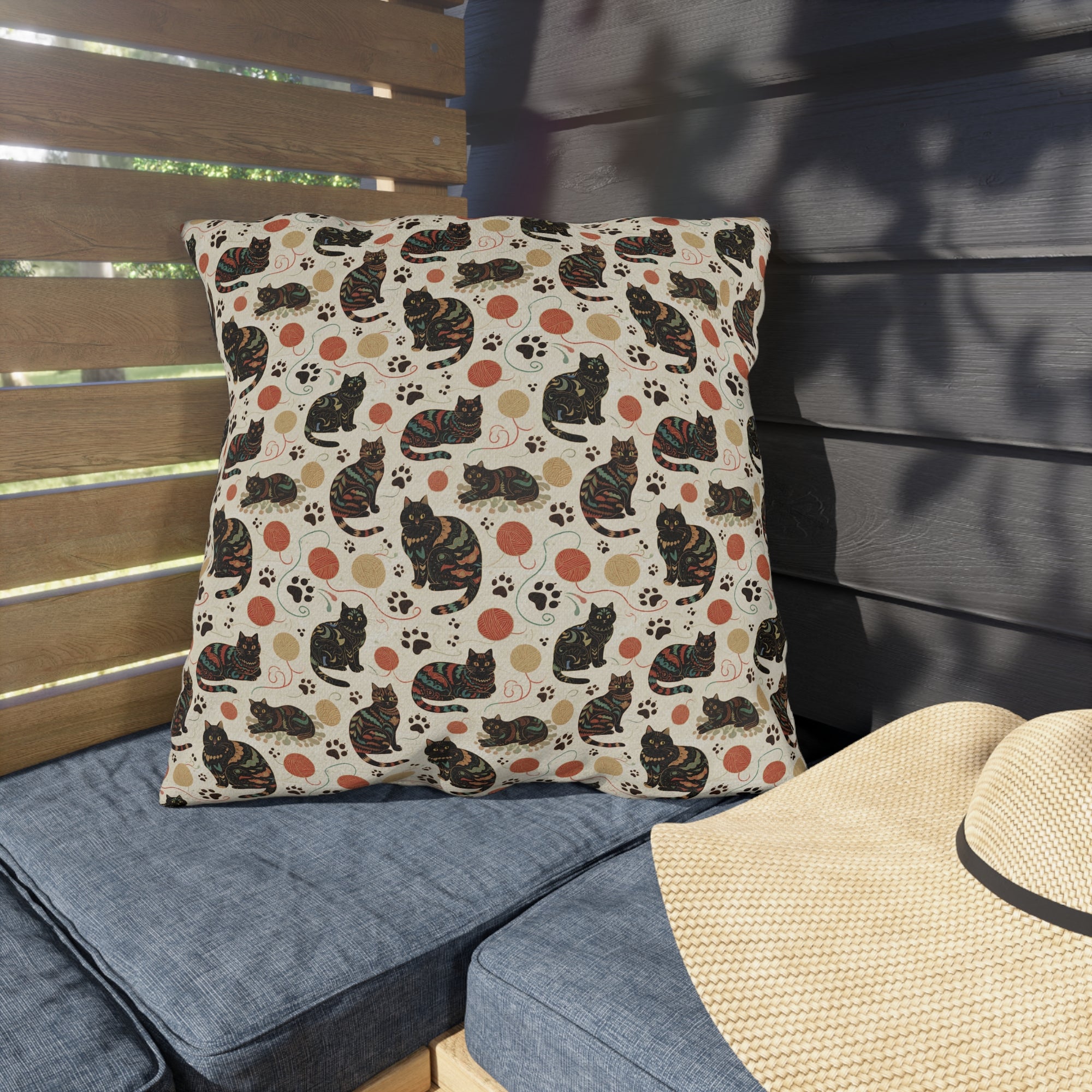 Outdoor Pillow - Intricate tribal patterned black cats, colorful folk art style, playful felines with yarn balls and paw prints, artistic and bohemian cat design, cream background, unique animal print