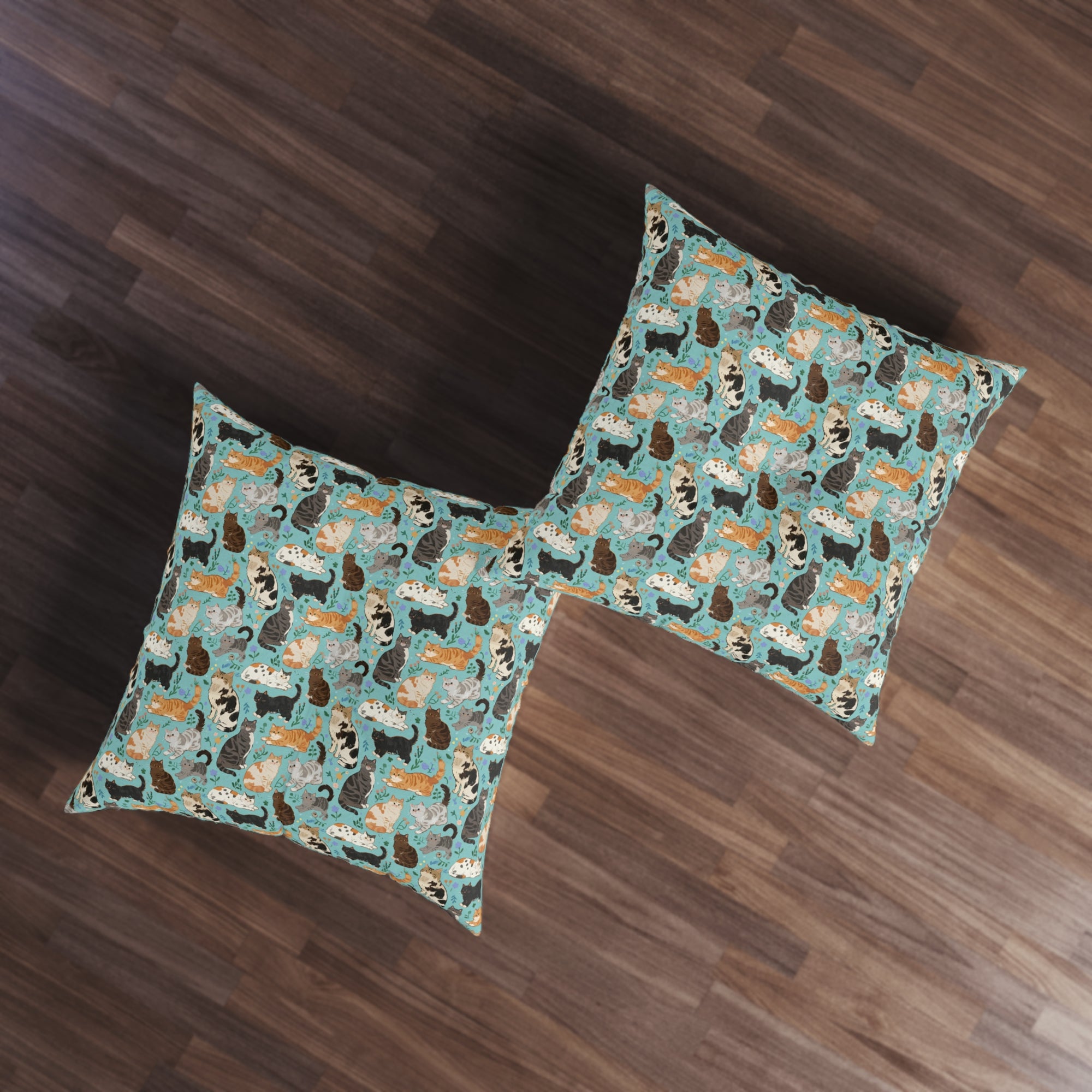 Indoor Square Floor Pillow - A Delightful Assortment of Charming Cats in Diverse Poses and Breeds Scattered Across a Soft Blue Floral Background