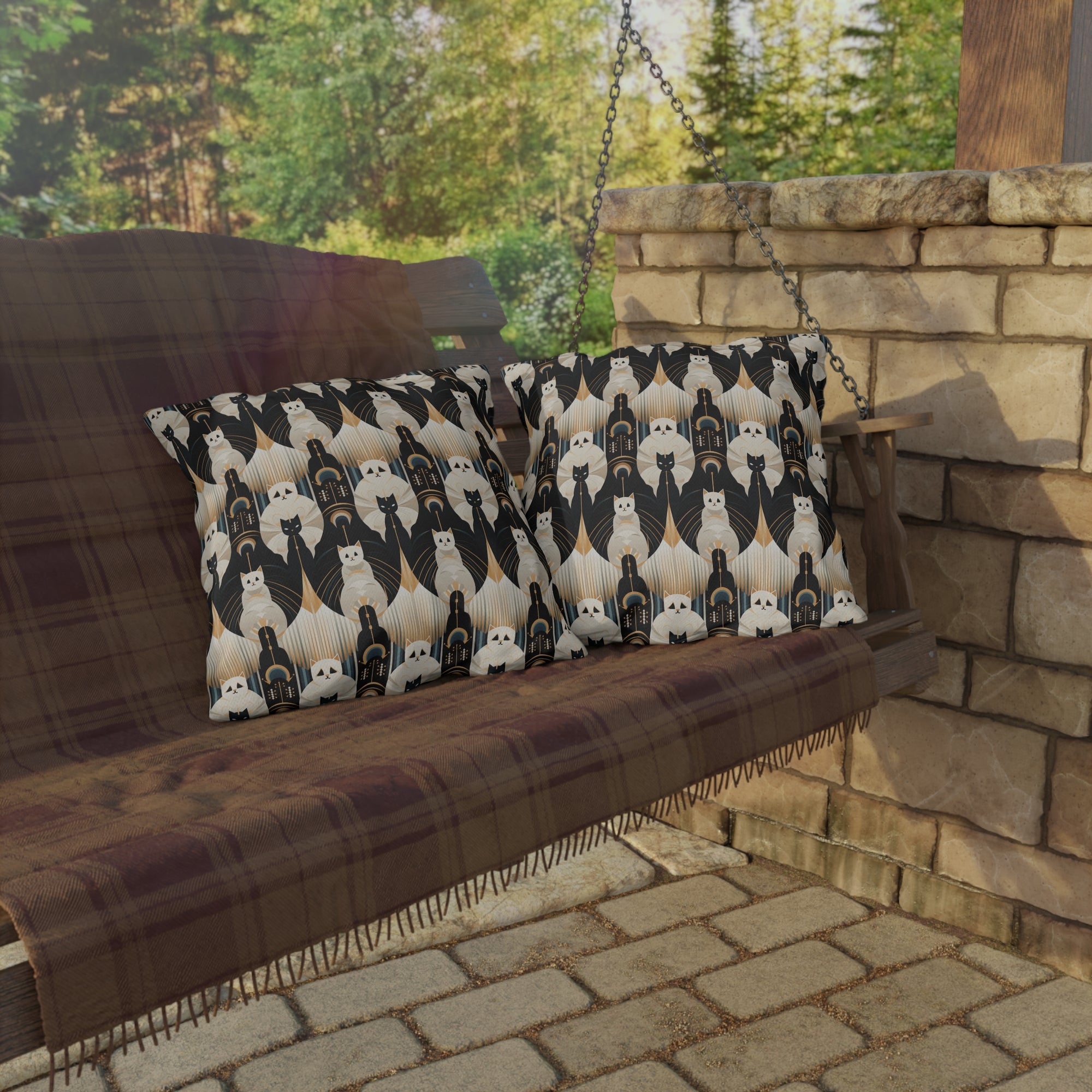 Outdoor Pillow - An elegant and artistic Art Deco-style pattern featuring streamlined white cats with a striking geometric backdrop of golden and black lines and shapes.