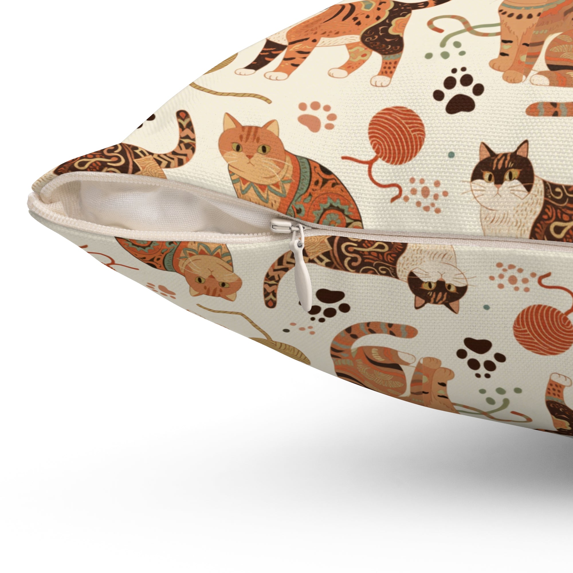 Indoor Square Pillow - Artistic patterned cats in warm earth tones, unique tribal and folk art designs, playful felines with yarn and paw prints, bohemian animal print, cream background, creative cat art