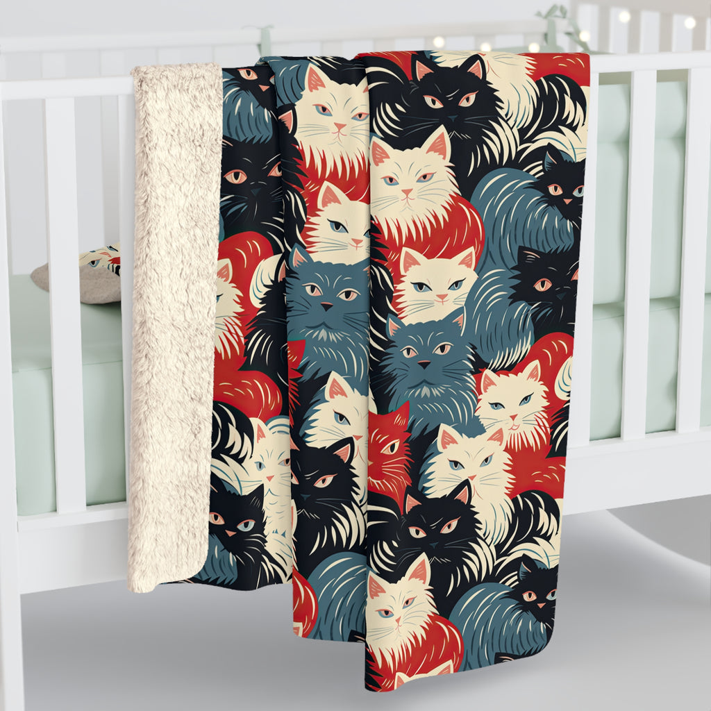Sherpa Blanket - A bold and graphic pop art style illustration featuring a tight-knit cluster of various fluffy felines in black, white, red, and blue.