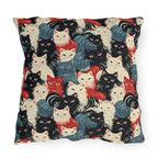 Outdoor Pillow - A bold and graphic pop art style illustration featuring a tight-knit cluster of various fluffy felines in black, white, red, and blue.