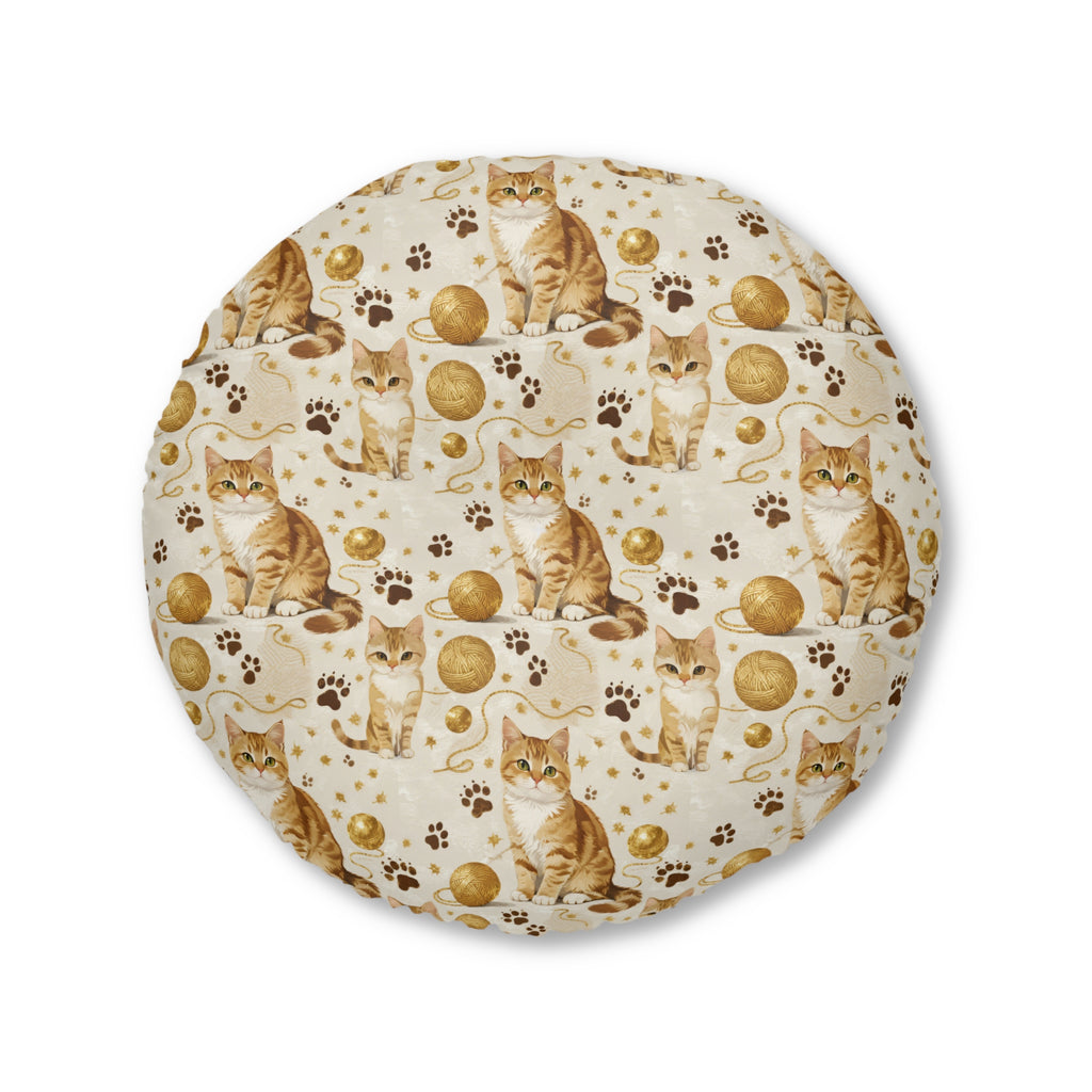 Indoor Round Floor Pillow - Adorable ginger cat with bright green eyes, sparkling gold yarn and paw prints, classic tabby cat illustration, cream background, cute and charming pet themed art