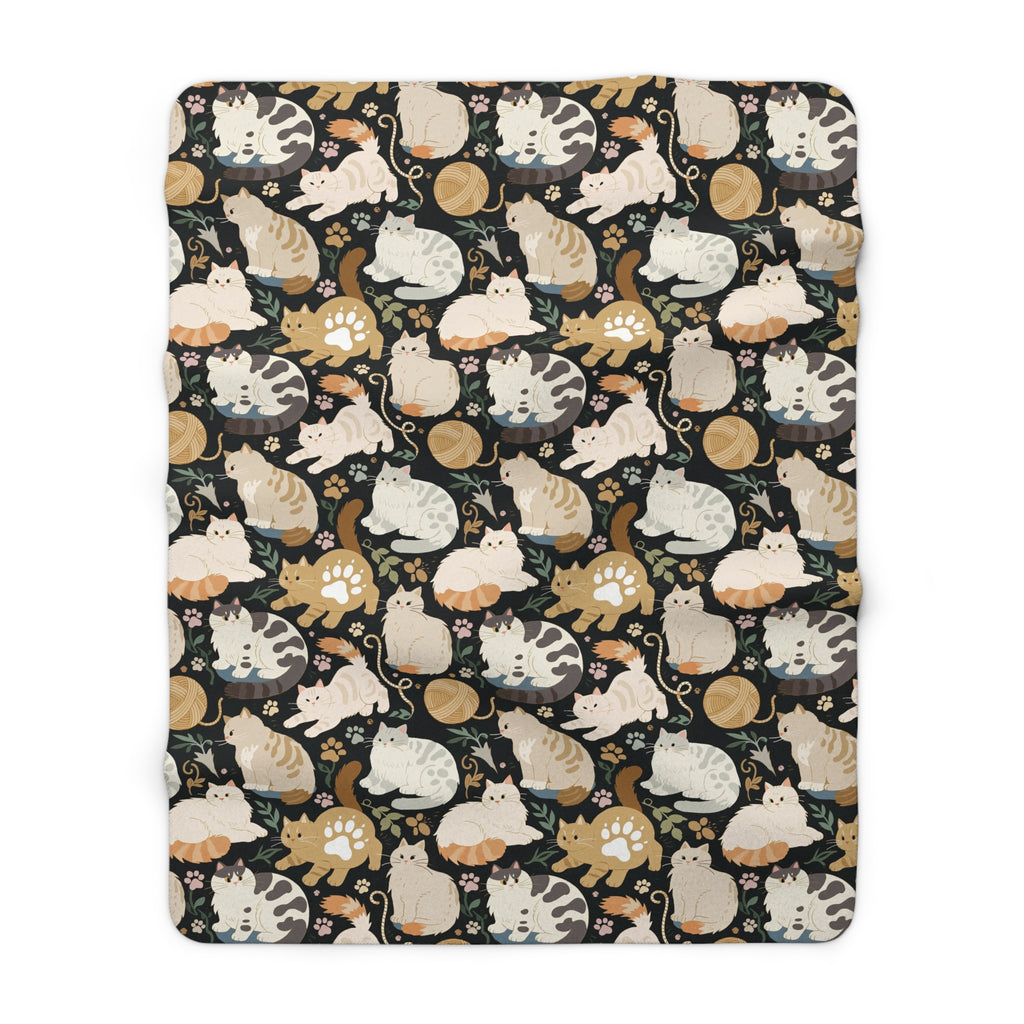 Sherpa Blanket - Diverse cats and kittens in a dark garden, various breeds and colors, soft natural tones with foliage and paw prints, charming animal illustration, dark background, gentle pet themed art