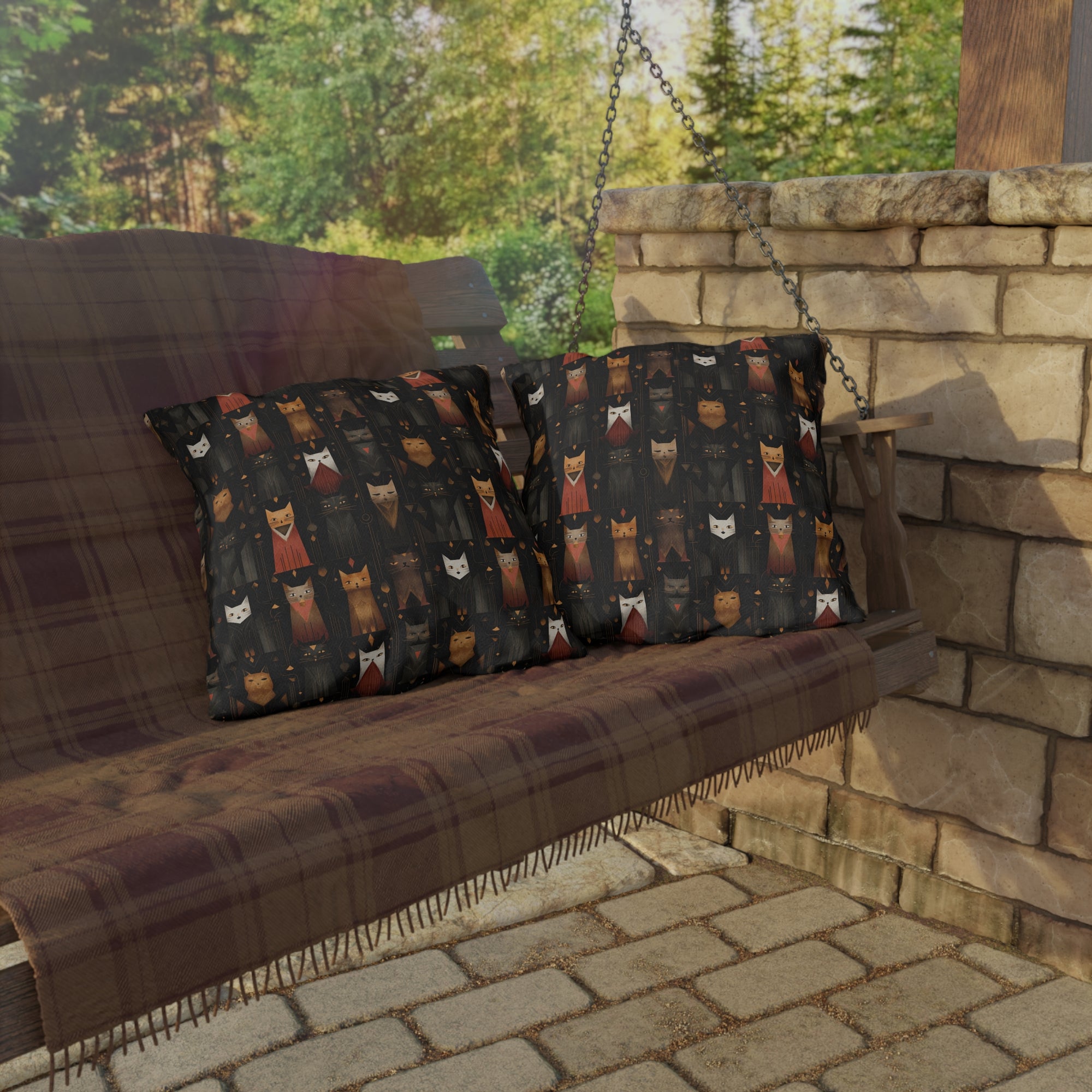 Outdoor Pillow - A striking and sophisticated Art Deco-style pattern of felines with bold, intricate lines and dramatic geometric shapes, all rendered in a unique gold and gray color palette.