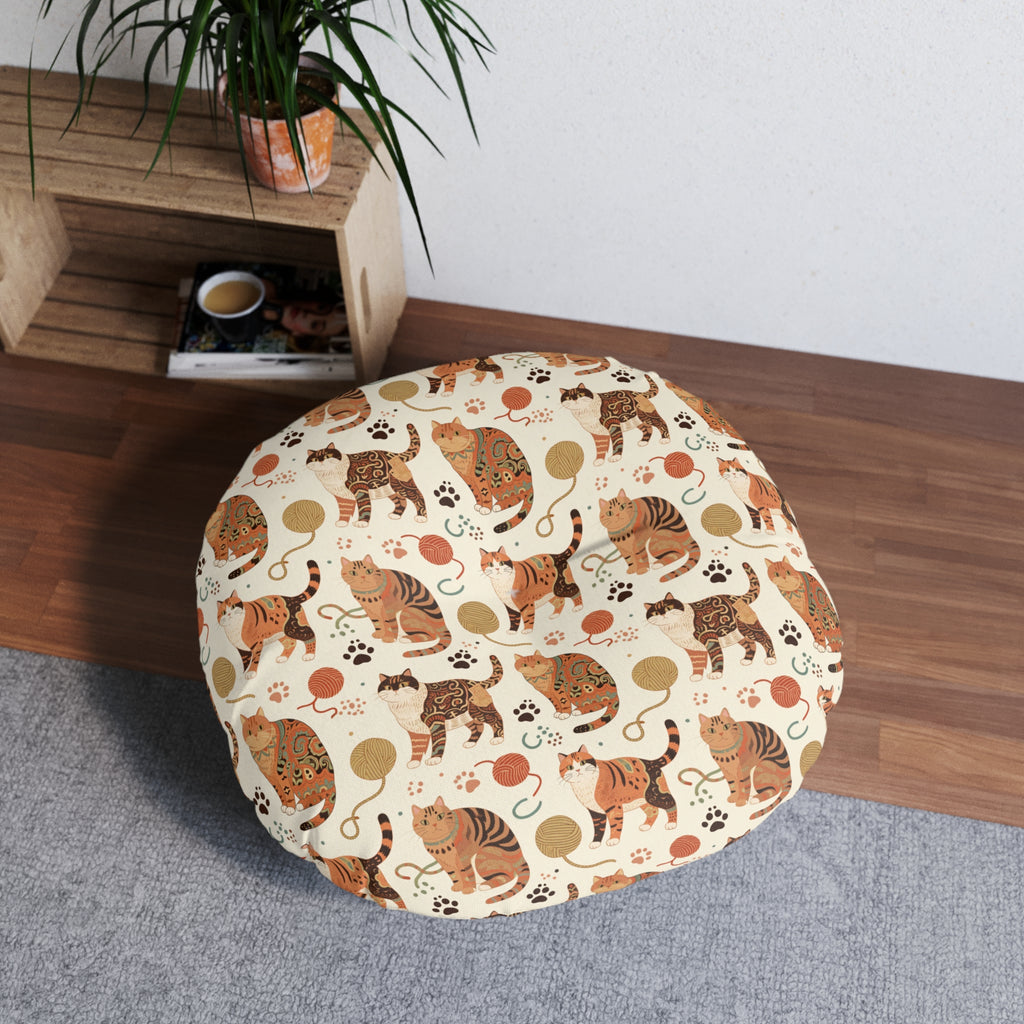 Indoor Round Floor Pillow - Artistic patterned cats in warm earth tones, unique tribal and folk art designs, playful felines with yarn and paw prints, bohemian animal print, cream background, creative cat art