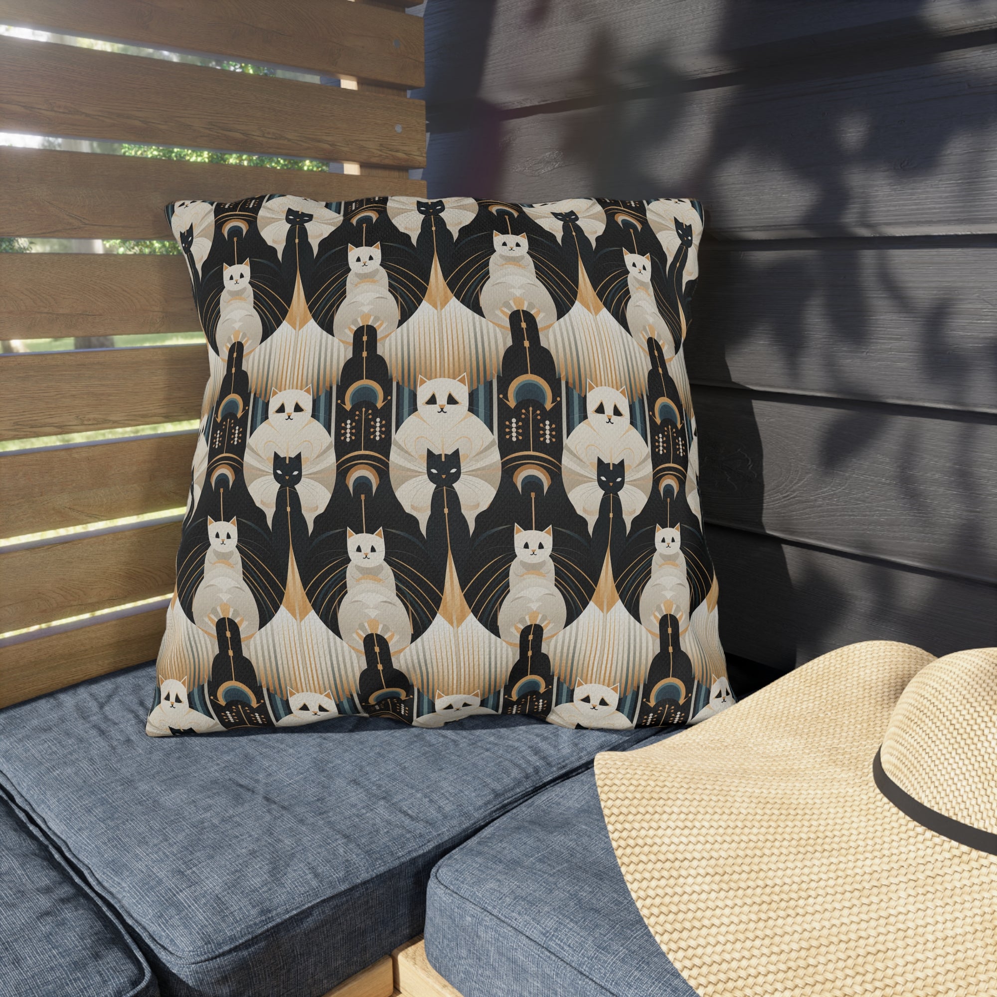 Outdoor Pillow - An elegant and artistic Art Deco-style pattern featuring streamlined white cats with a striking geometric backdrop of golden and black lines and shapes.