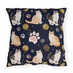 Outdoor Pillow - Charming cats and golden yarn playful design, cute kittens with paw prints, whimsical animal art for cat lovers, dark blue background, delightful pet themed illustration