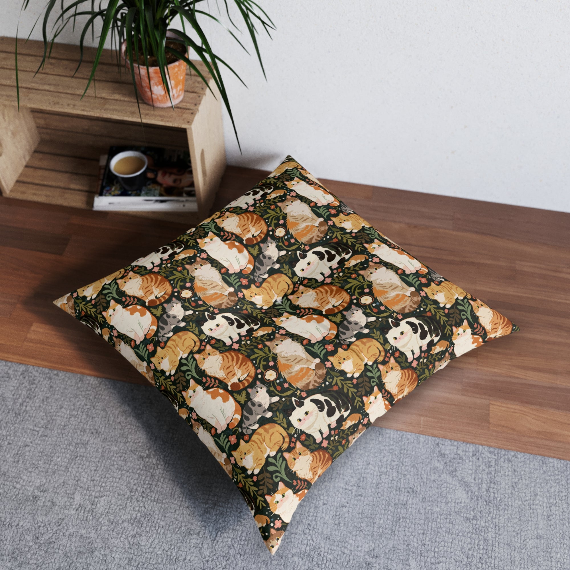 Indoor Square Floor Pillow - Whimsical cat and kitten garden party, various cat breeds amidst green foliage and pink flowers, charming animal illustration, dark forest green background, playful and natural art