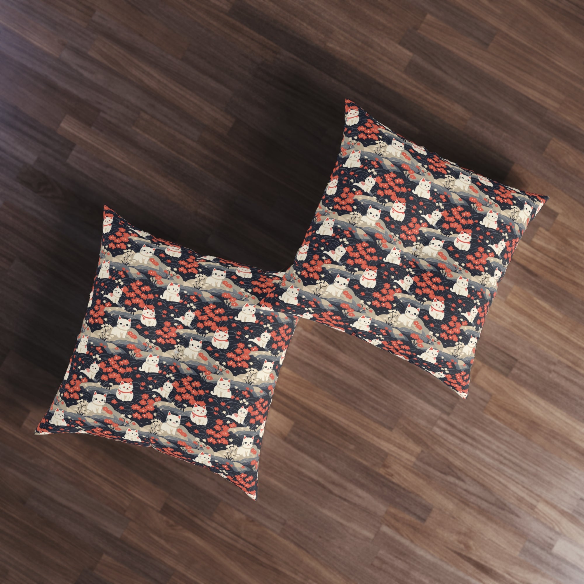 Indoor Square Floor Pillow - A charming, minimalist, Japanese-style illustration of cute white cats sitting amongst vibrant red and white flowers on a dark background.