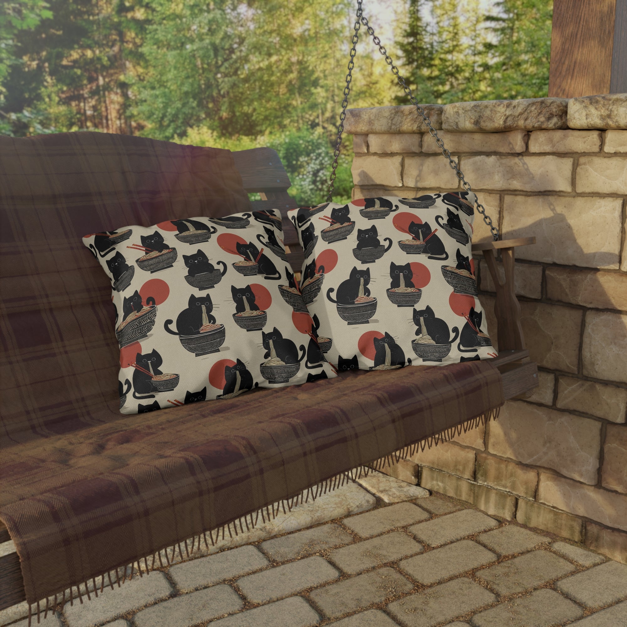 Outdoor Pillow - A whimsical and delightful hand-drawn style pattern of adorable black cats eating bowls of delicious ramen noodles with a large red sun in the background.