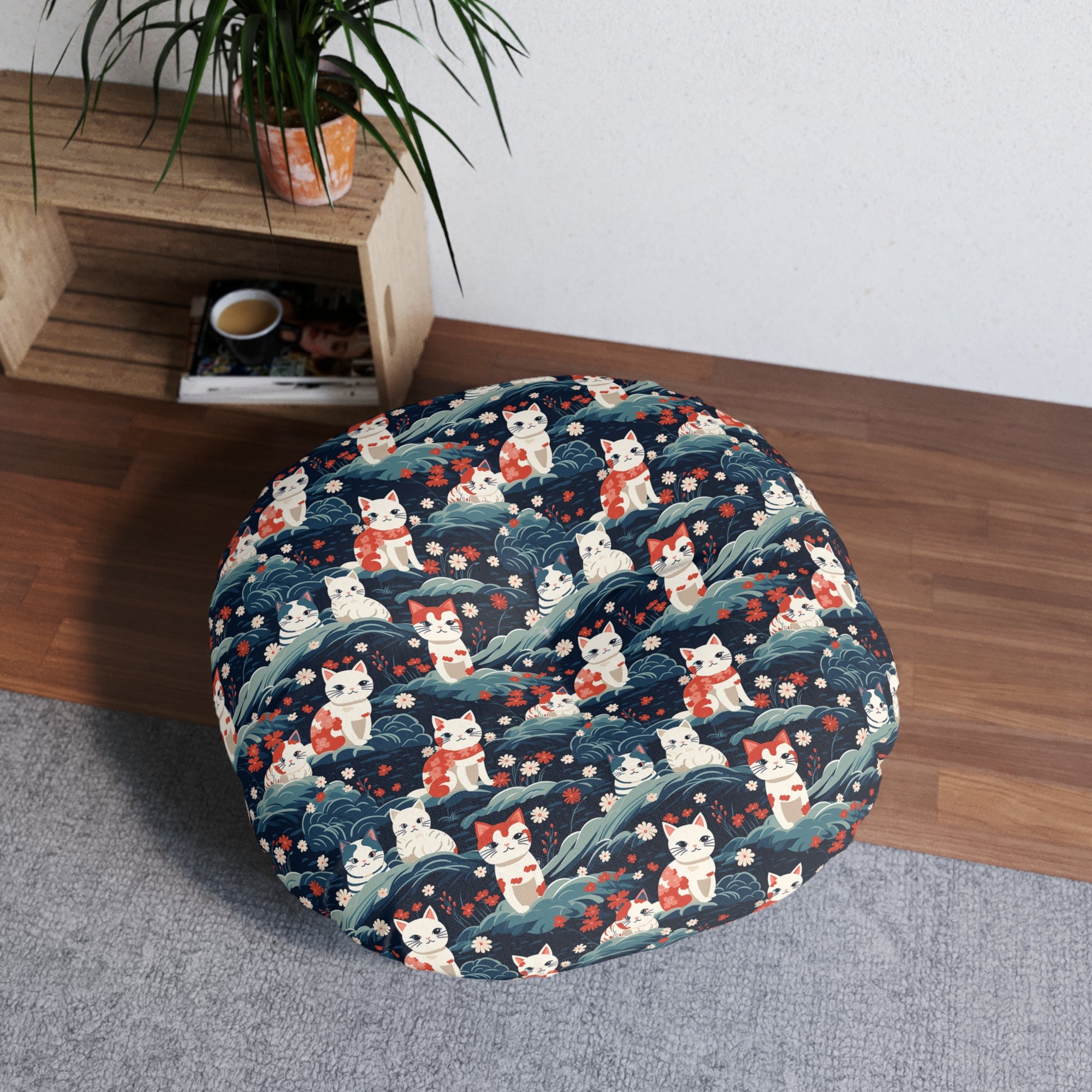 Indoor Round Floor Pillow - A serene and sweet Japanese landscape pattern featuring multicolored cats relaxing within a tranquil field of red and white flowers and gentle blue hills.