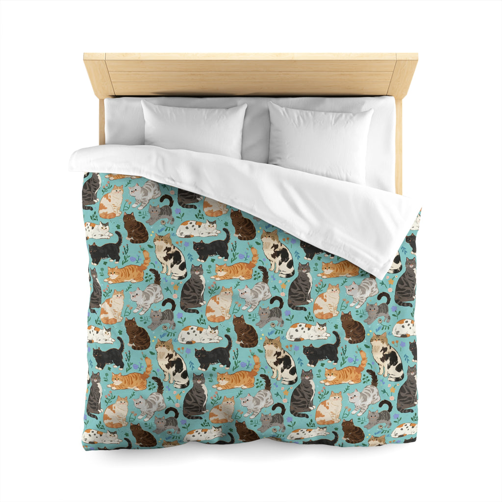 Duvet Cover - A Delightful Assortment of Charming Cats in Diverse Poses and Breeds Scattered Across a Soft Blue Floral Background